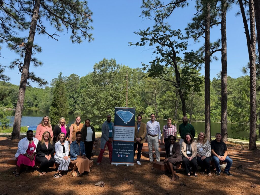 photo of people outside with a BASC sign